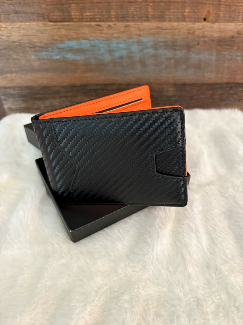 Mens Black Carbon-Texture Bifold Wallet with Orange Interior